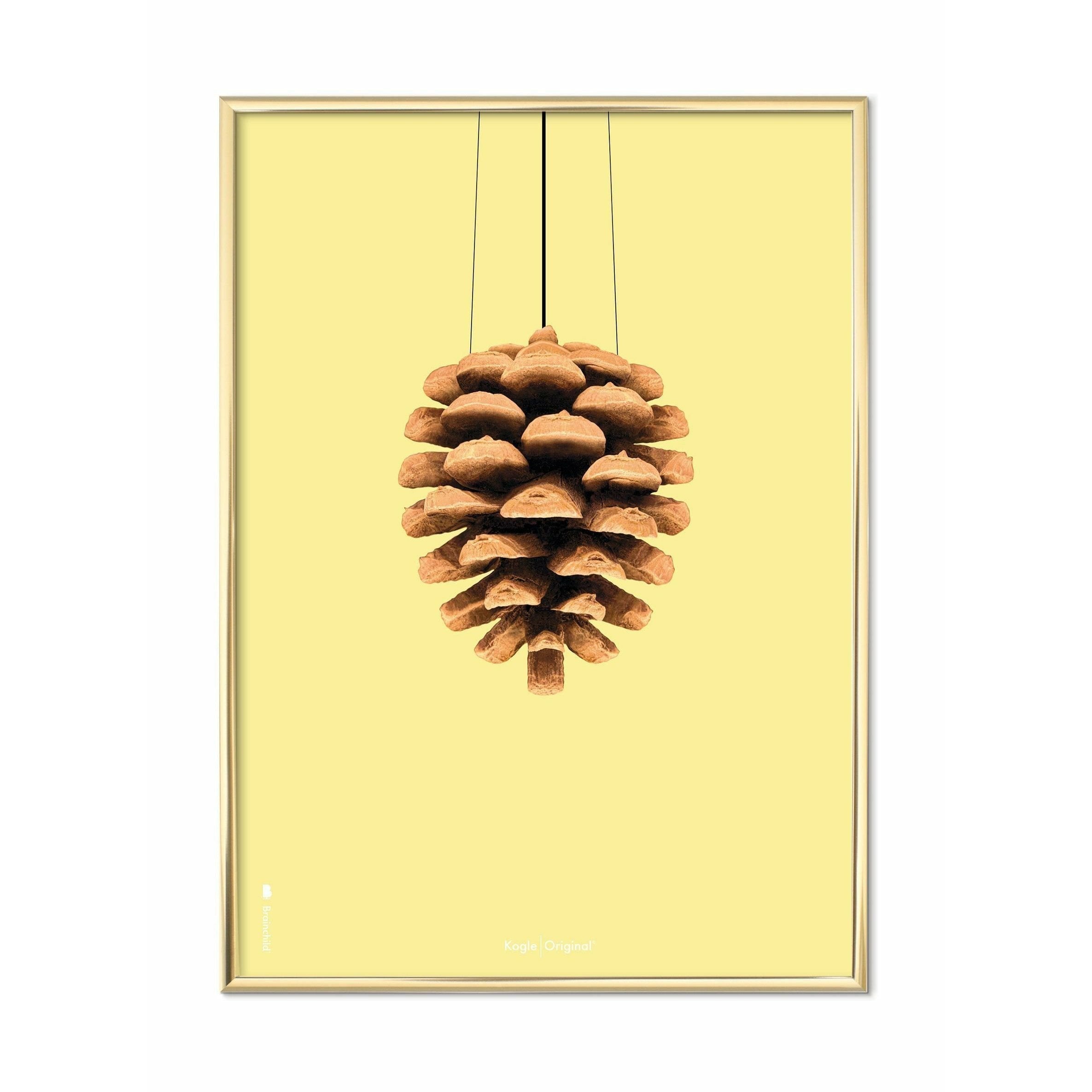 brainchild Pine Cone Classic Poster, messingramme 50x70 cm, gul baggrund