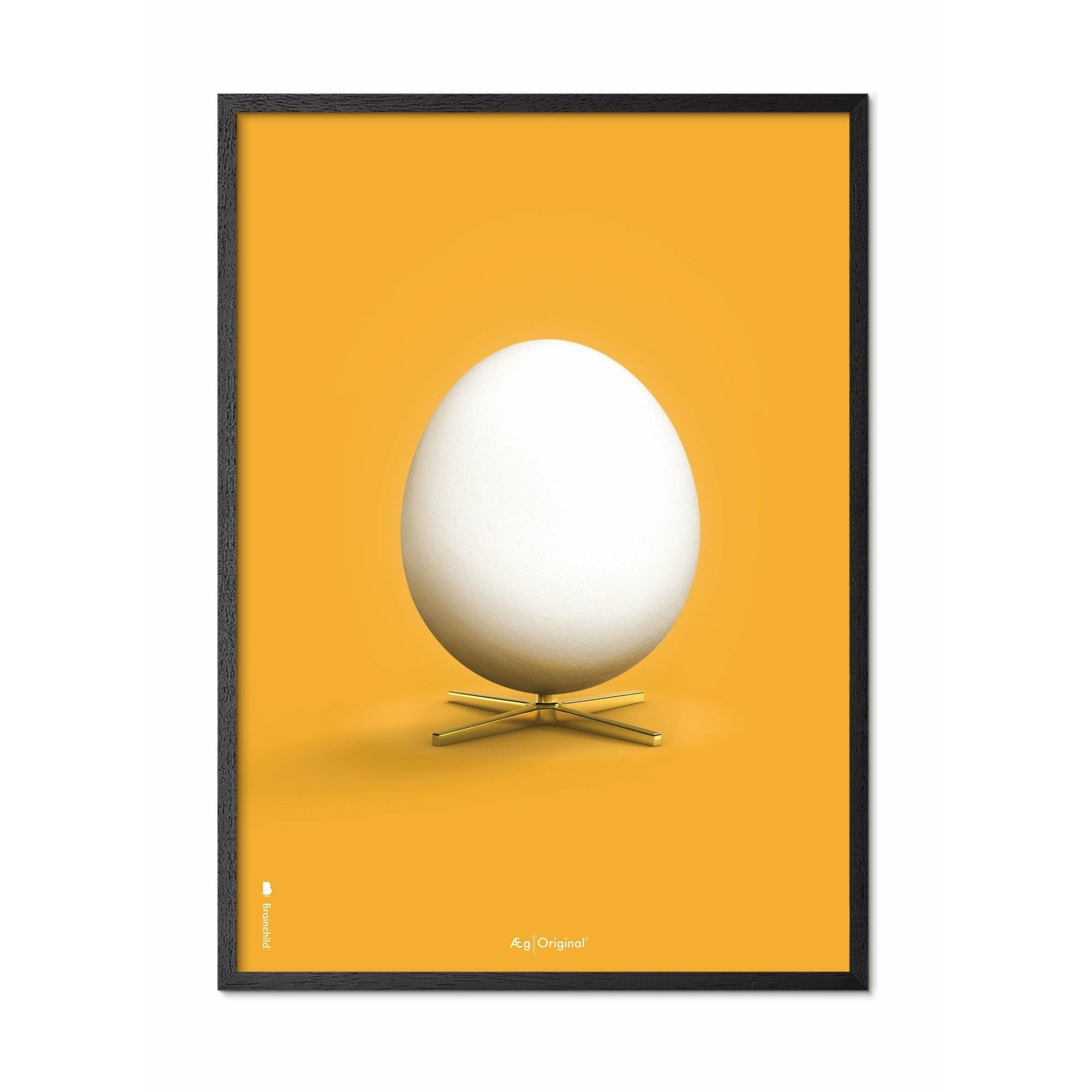 [product_category]-Brainchild Egg Classic Poster, Frame In Black Lacquered Wood 50x70 Cm, Yellow Background-Brainchild-13003-C-BRA-1