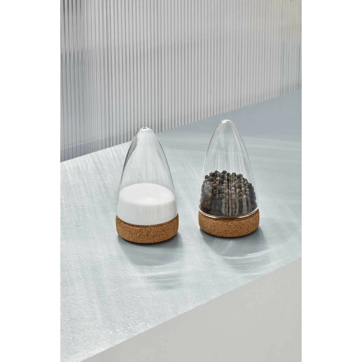 Two Puik Boeien salt and pepper shakers on a table.